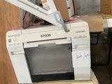 an image of a printer sitting on top of a desk