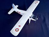a model airplane that is sitting on a blue surface