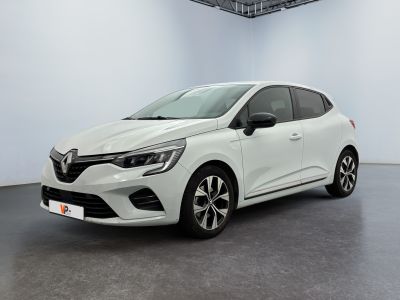 a white car in a white room with a black floor