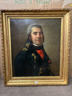 tableau représentant un homme en uniforme militaire, dans un cadre doré