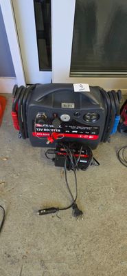 an image of a portable generator in the corner of a room