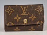 louis vuitton monograme leather wallet with gold hardware