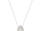 a white gold and diamond necklace with a tear shaped pendant