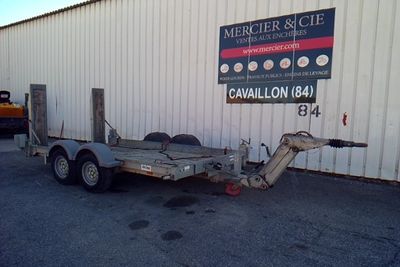 an image of a trailer parked in front of a building