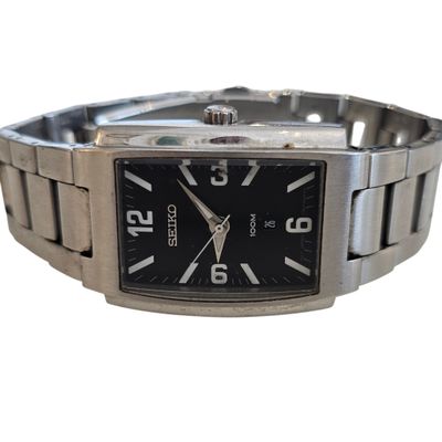 an image of a close up of a wrist watch on a white background