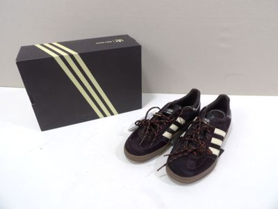 adidas superstar shoes in black and white with a box