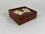 an image of a wooden box with playing cards inside of it