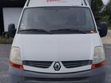 a white van that is parked in a parking lot