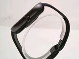 a close up of a smart watch on a stand