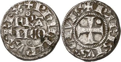 a silver coin with a cross on the front and a cross on the back