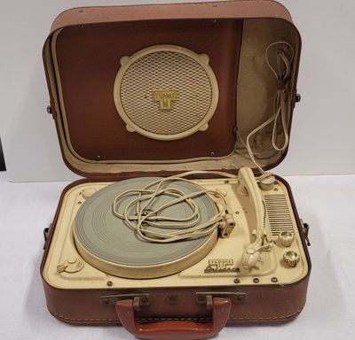 a suitcase that has a record player inside of it