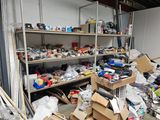 a room full of clutter and junk in a garage