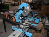 a picture of a mitring saw on a table in a workshop