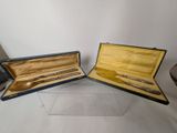 two open cases that are sitting on a table