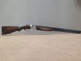 a rifle that is sitting on top of a table next to a wall