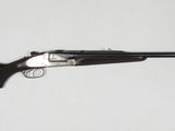 the rifle is mounted on the wall and ready to be used