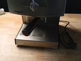 an image of a coffee machine on a wooden table