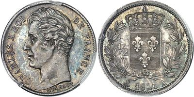 a silver coin with the image of a man ' s head on it