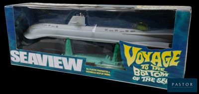 the box is open to show the model of a submarine