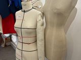 two mannequins on display in a clothing store
