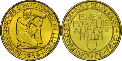 a gold coin with the image of a man holding a baseball bat