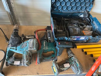 many tools that are laying out on the floor