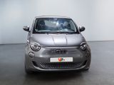 a small car that is parked in a large room