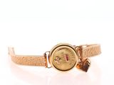 an image of a close up of a watch on a white surface