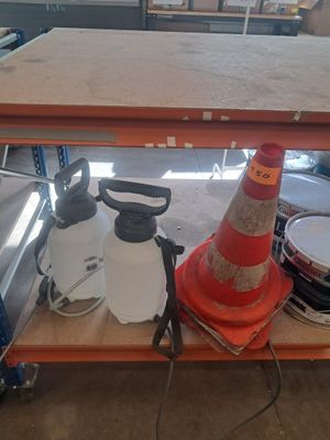 a large orange cone sitting on a shelf in a room