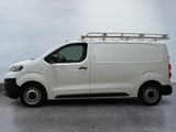 a white van that is parked in a parking lot
