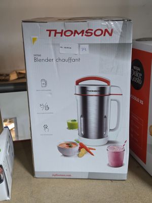 a box with a blender and a blender on the counter