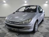 a picture of a silver car parked in a garage