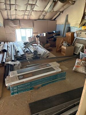 a room with a lot of junk in it