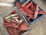 a box full of pieces of wood next to a box of pieces of wood