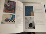 an open book with pictures of various objects in it