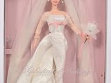 La poupée Barbie « Mariage » est présentée dans une boîte avec un voile et un voile