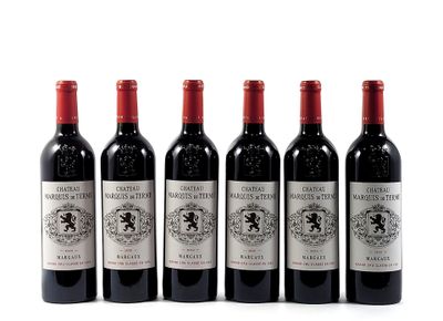 six bottles of wine are lined up on a white surface