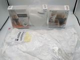 three boxes of baby products sitting on a white table