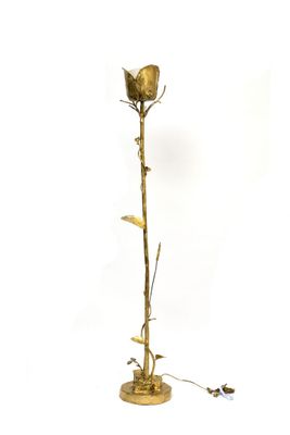 brass plated floor lamp with a single rose on a stem