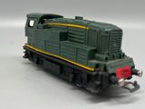 a toy train that is sitting on a white surface