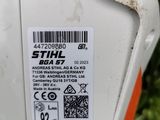 a close up of a parking meter with a sticker on it