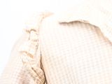 a close up of a woman wearing a shirt and tie
