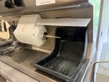 an image of a machine that is being used to make dough