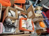 many boxes of assorted items sitting on the floor