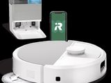 an image of a robotic vacuum cleaner with a phone on top of it