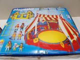 a box of playmobil with a circus tent on it