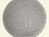 a picture of a glass bowl with a design on it
