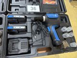 a tool in the case that is sitting on the floor