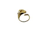 a close up of a gold ring with a lizard on it ' s head