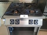 a stainless steel stove and oven in a kitchen